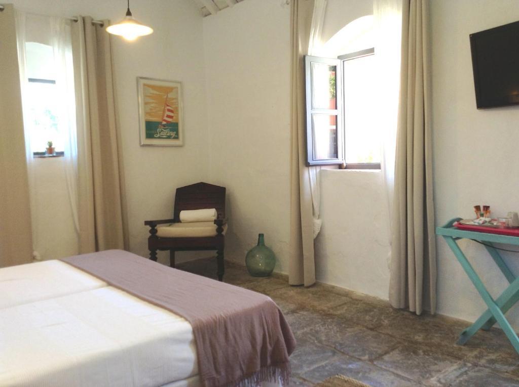 Cortijo El Pozuelo Guest House Tarifa Rom bilde